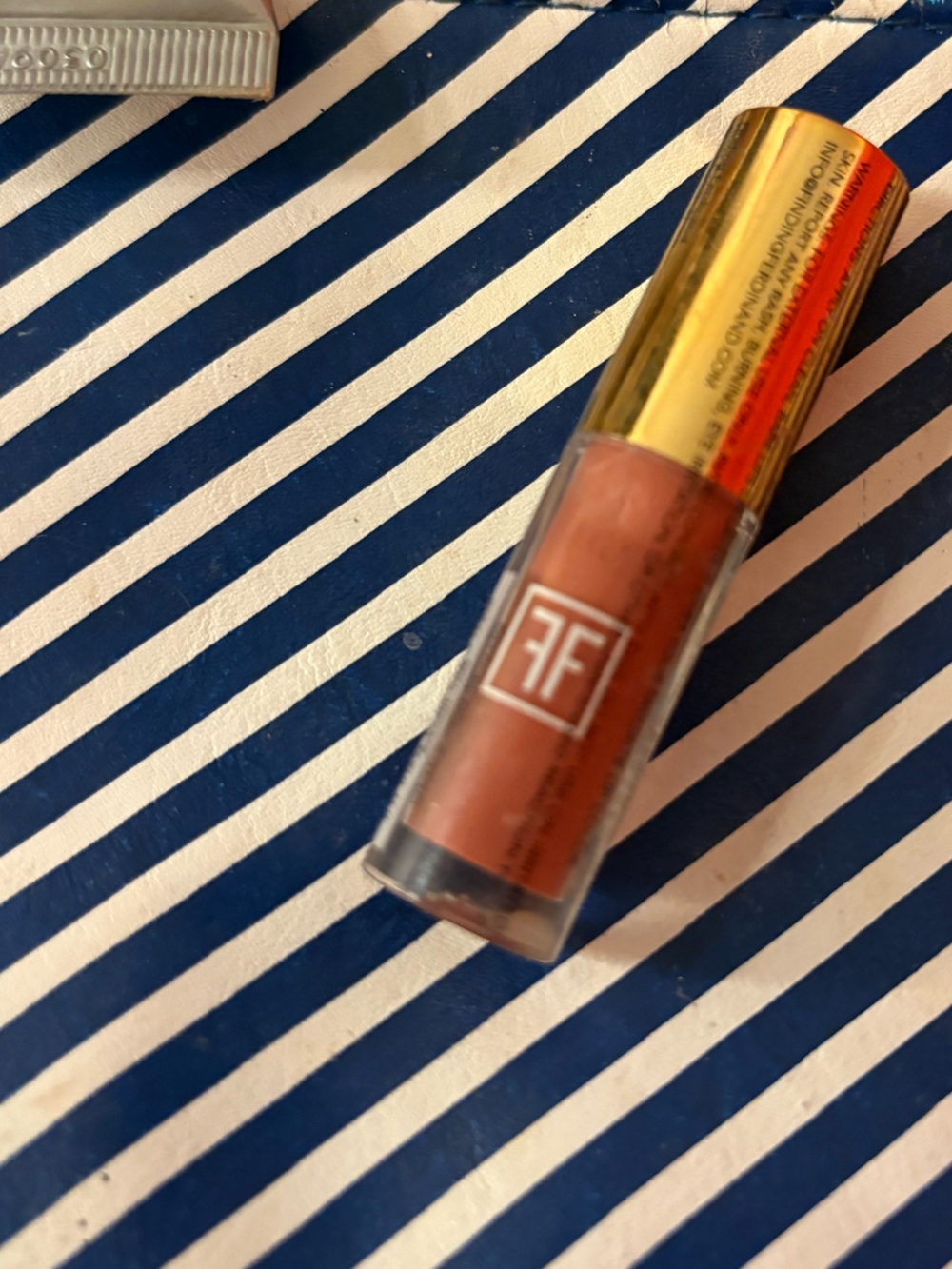 Finding Ferdinand Lip Gloss in Thorn